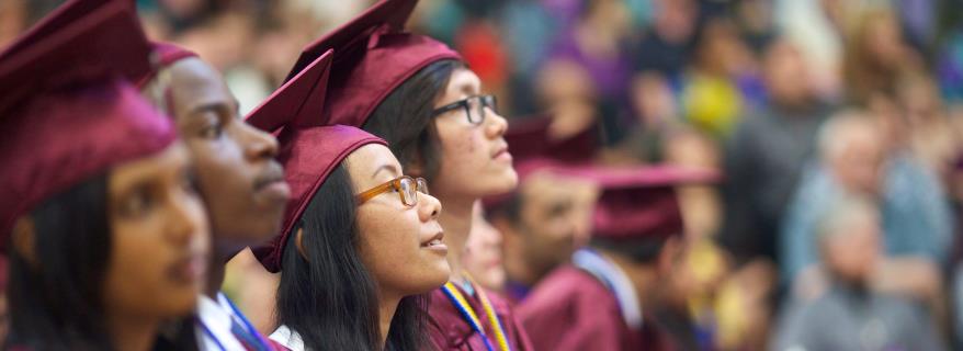 Close up of graduates