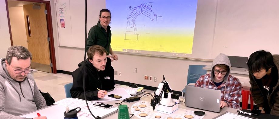 Engineering in Context students apply math concepts to the operation of a robotic arm