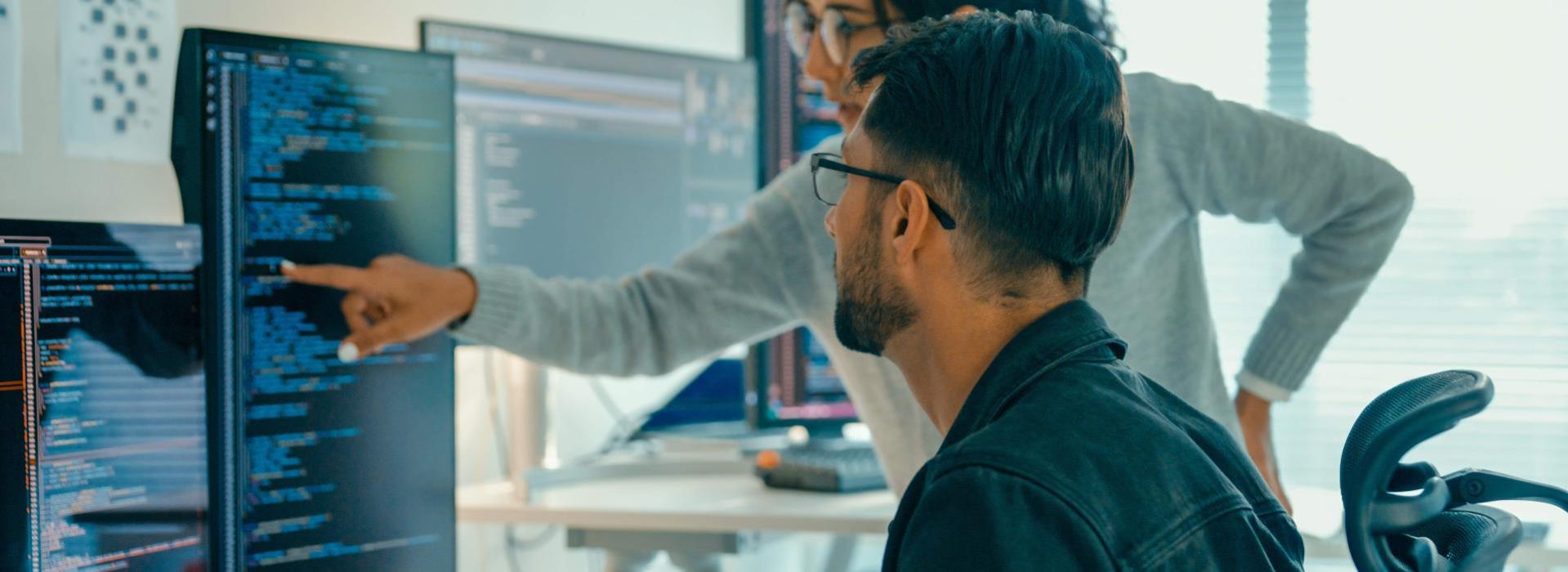 Man and woman at computer