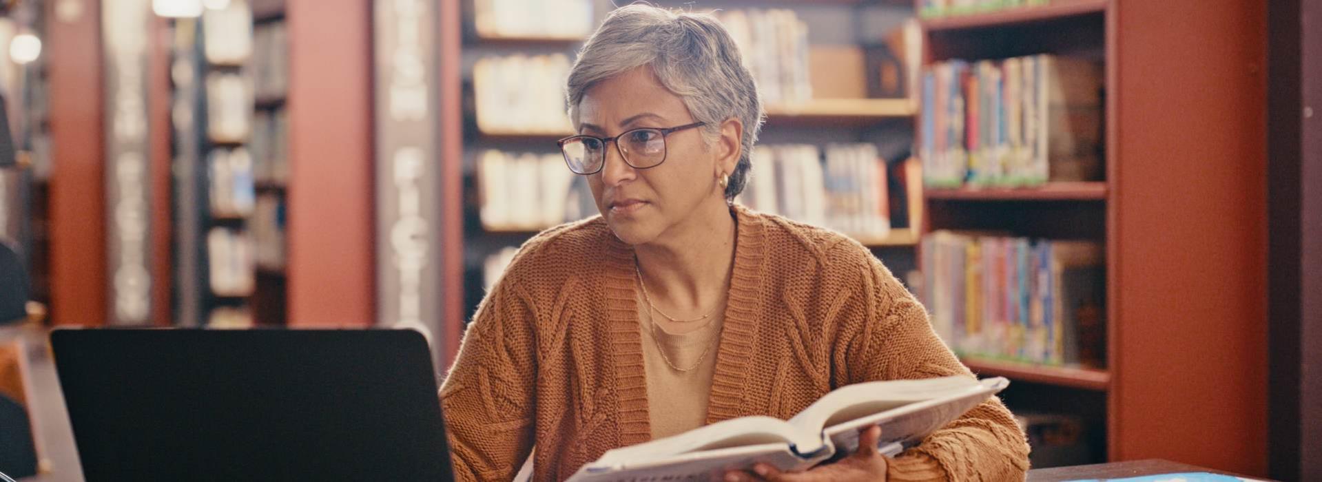 Senior woman in library