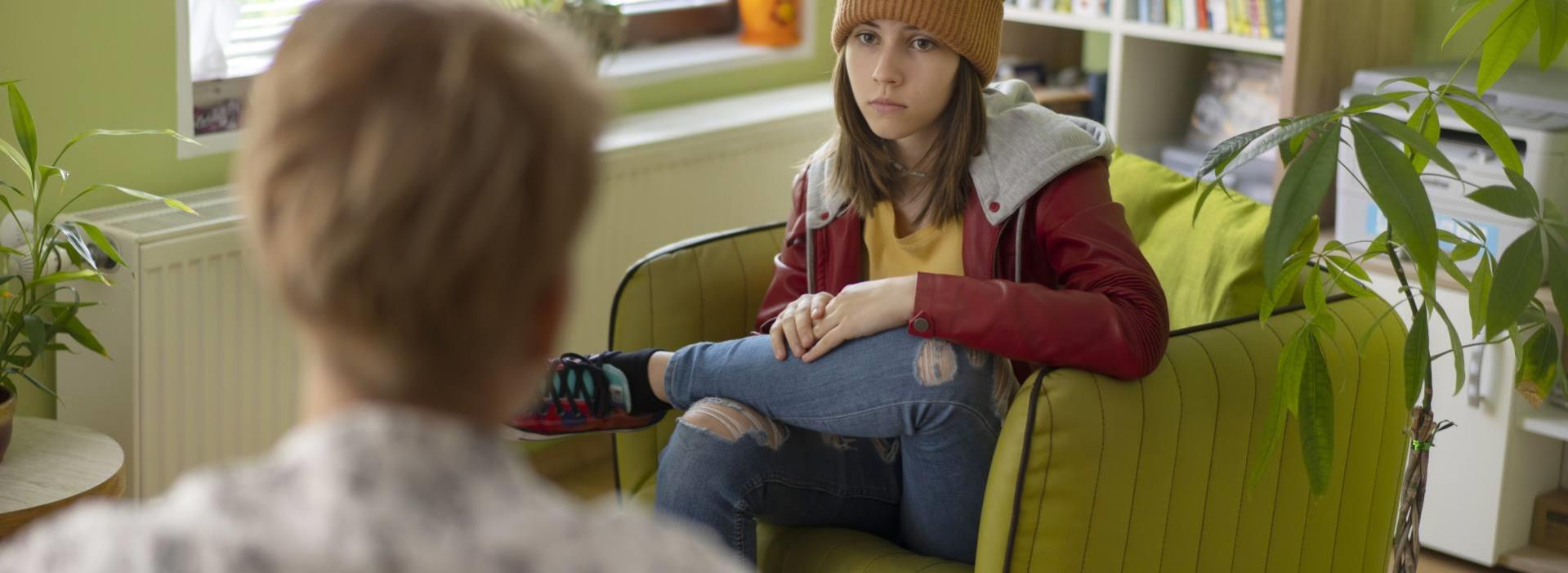 Woman counselor with troubled teen